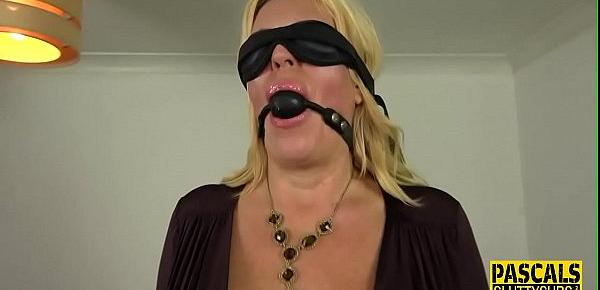  Tied up and blindfolded busty milf sub